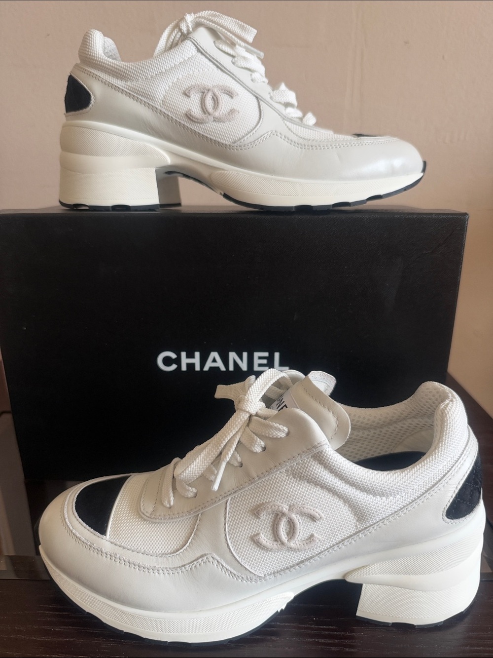 CHANEL heeled White Sneakers with Black quilted accents. RARE - sold out